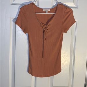 Orange/tan shirt